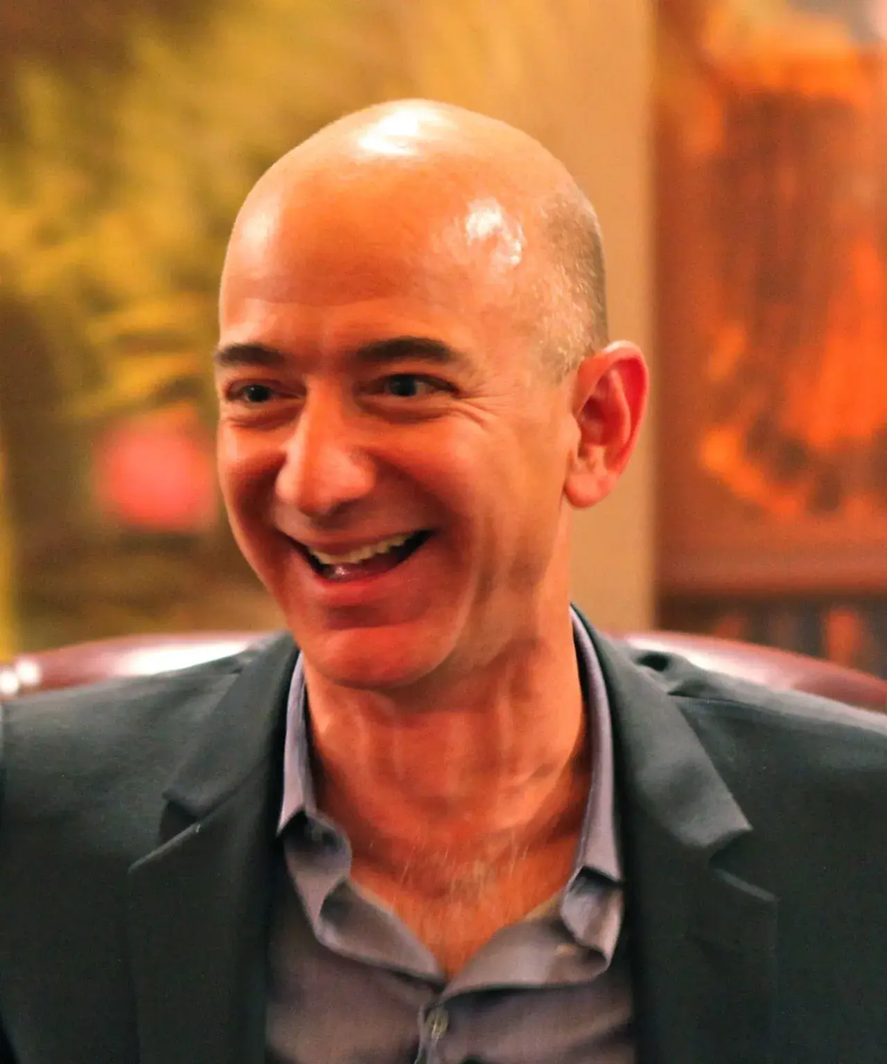 Jeff Bezos is captured in his signature laugh during the ENCORE awards ceremony.