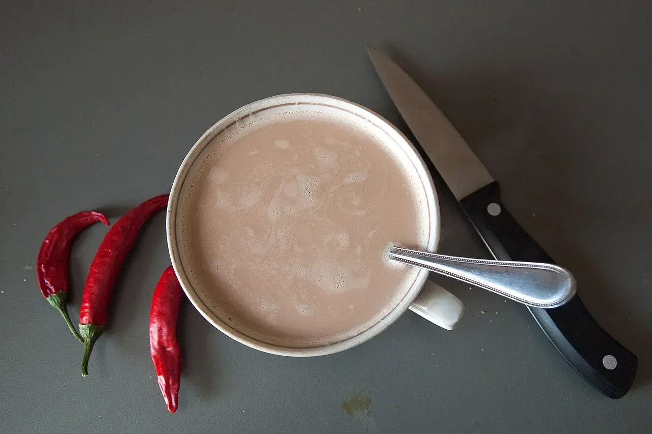 A steaming cup of instant coffee with milk, captured in Rostov-on-Don, Russia.