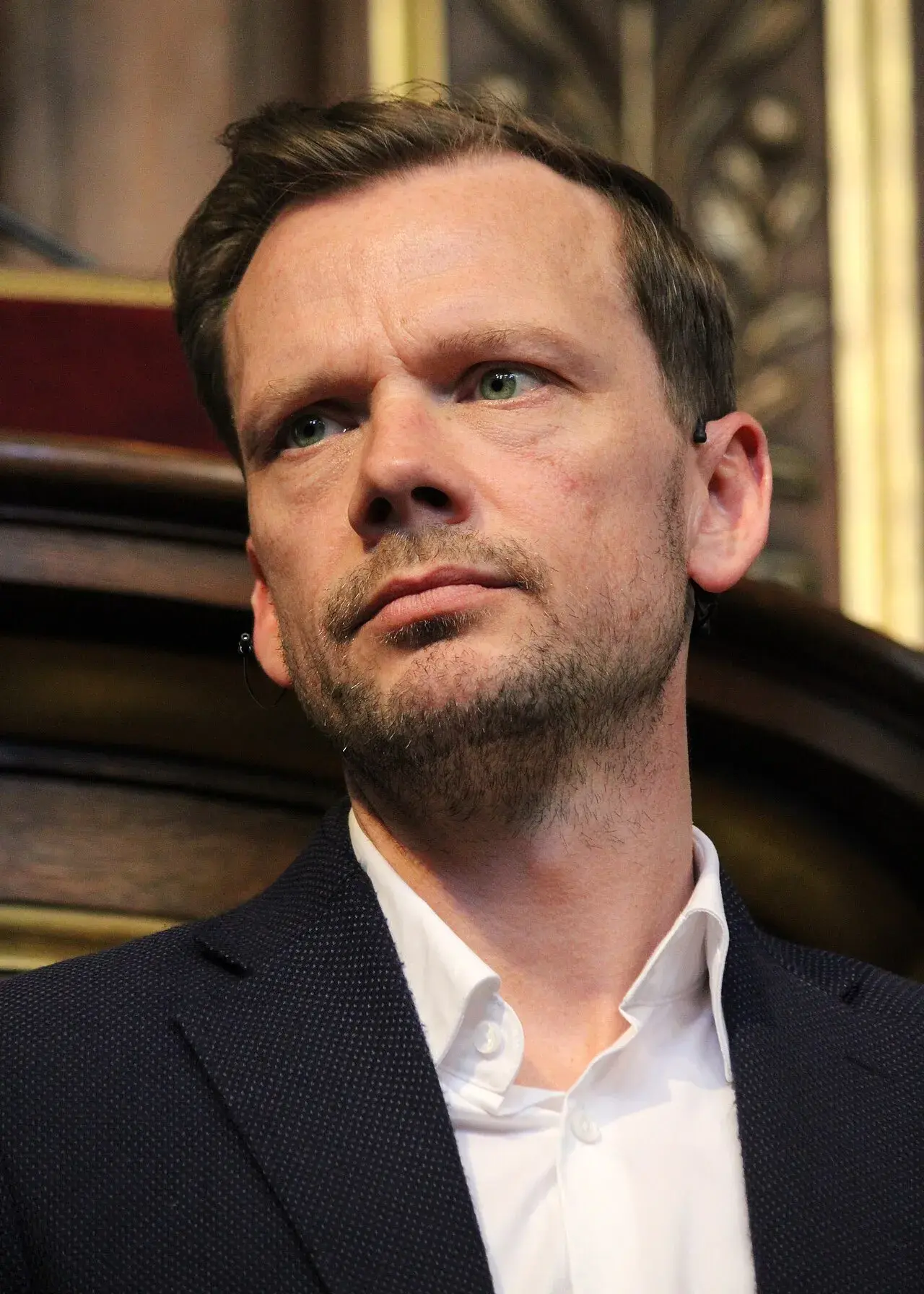 Peter Hummelgaard taler under en politisk debat i Festsalen på Københavns Universitet. Billedet er taget i København i 2026.