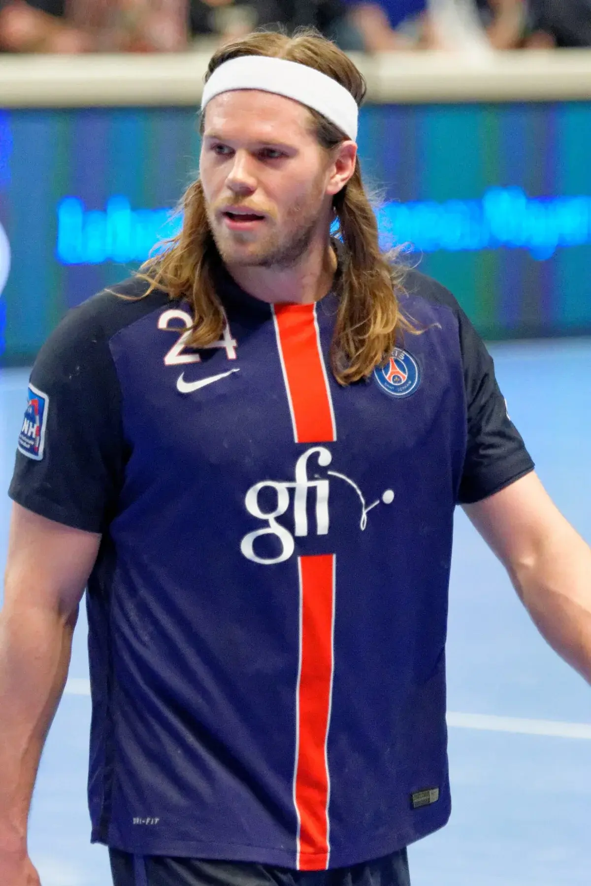 Mikkel Hansen in a PSG Handball jersey during a match.