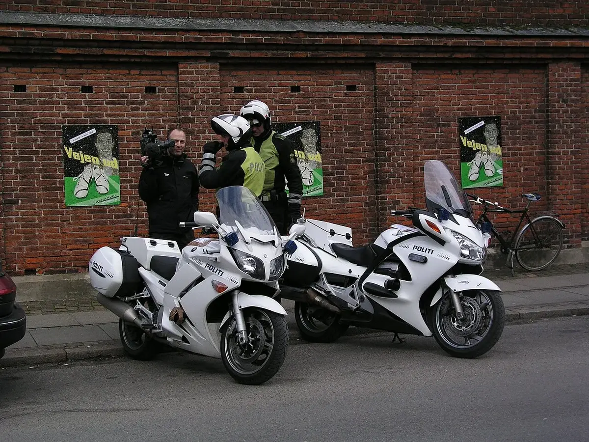 Danish police officers with motorcycles on a street in Aalborg