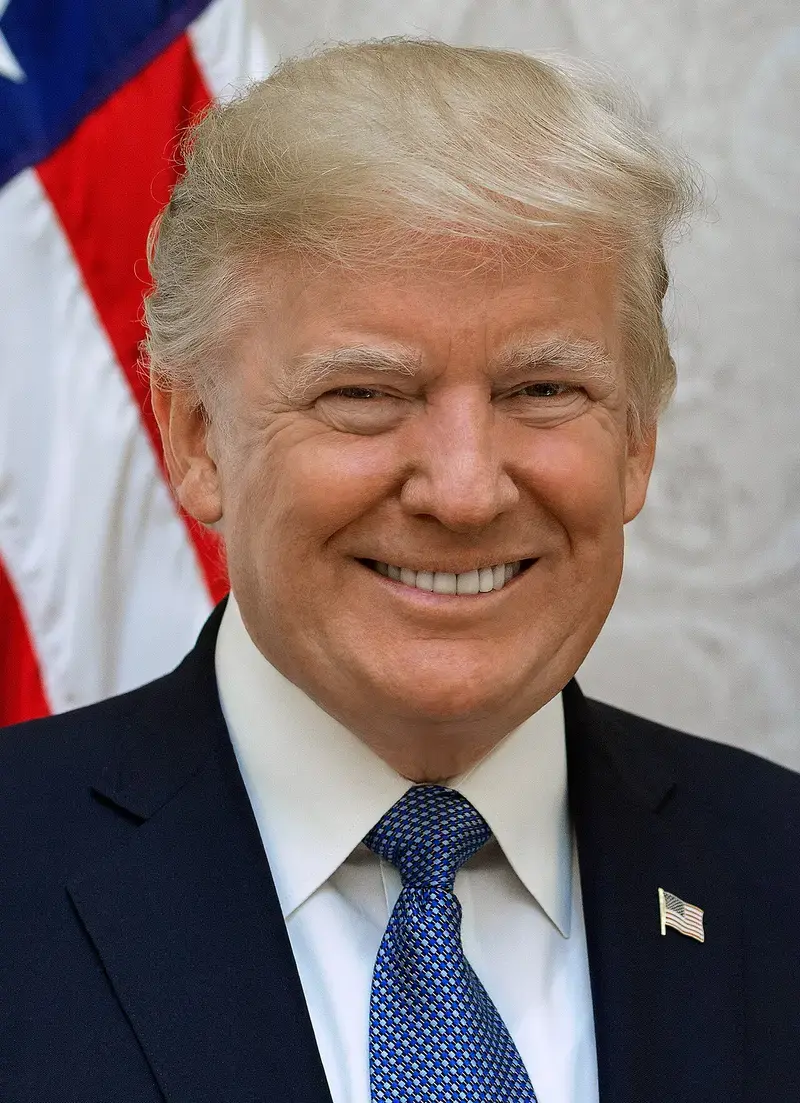 Close-up official portrait of Donald Trump smiling