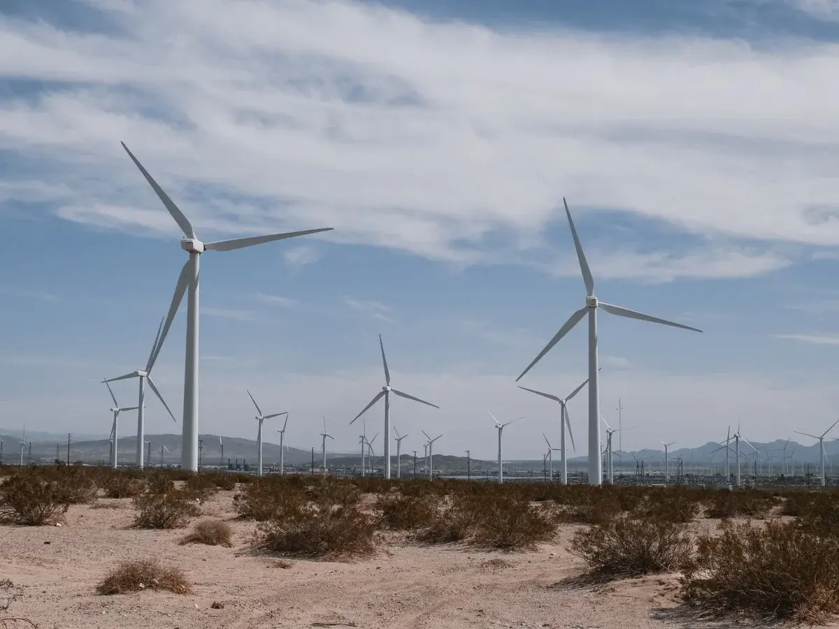wind turbines in a desert landscape