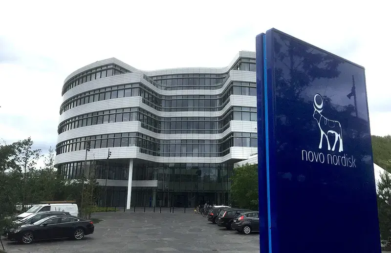 Novo Nordisk headquarters building with company sign in the foreground