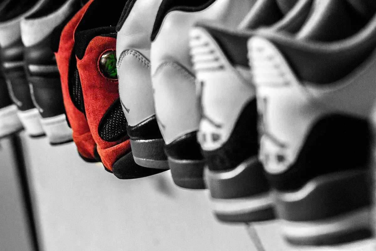 Row of shoes displayed in a collection