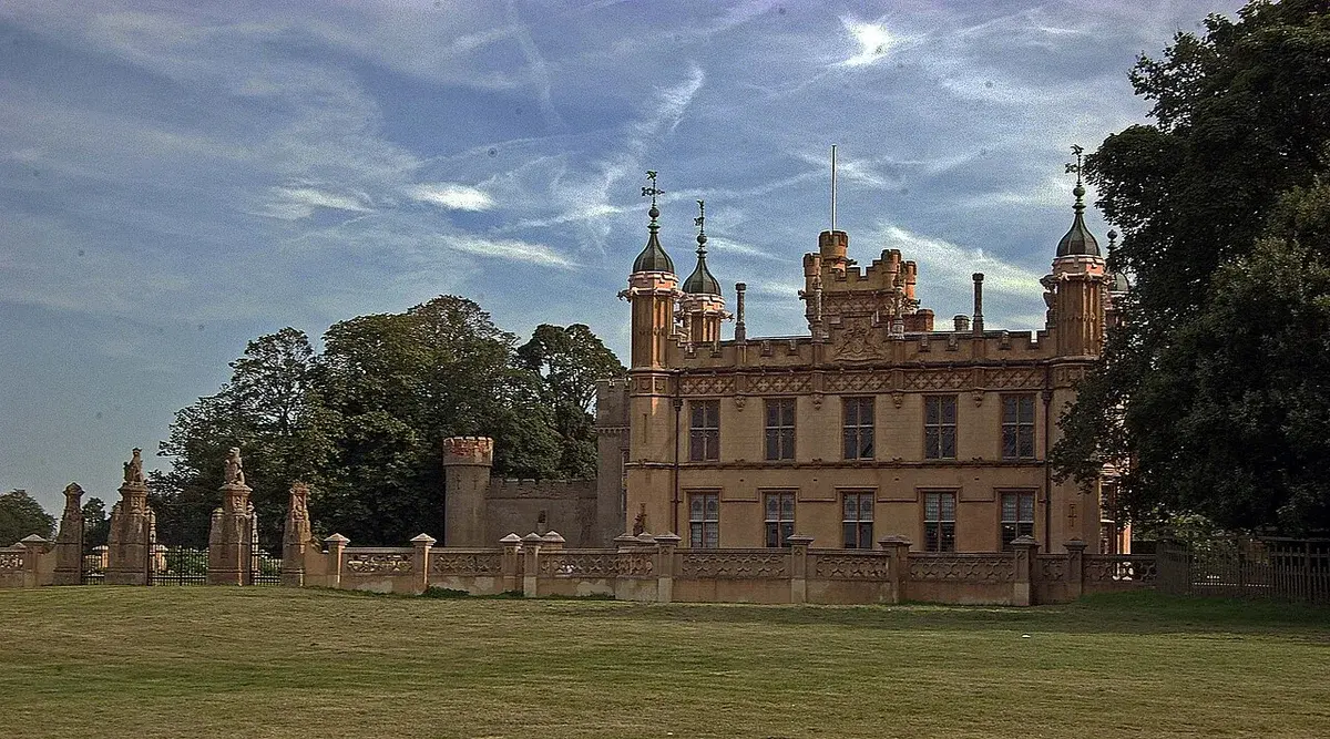 Knebworth House, a historic English manor with towers and turrets.
