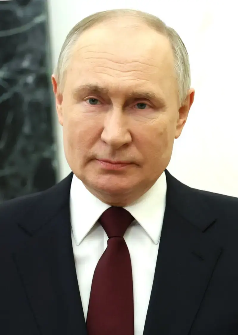 Close-up portrait of Vladimir Putin in a suit and tie