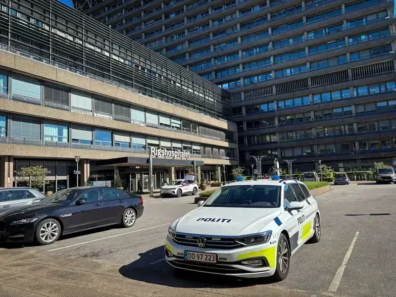 Danish police car parked in front of Rigshospitalet hospital