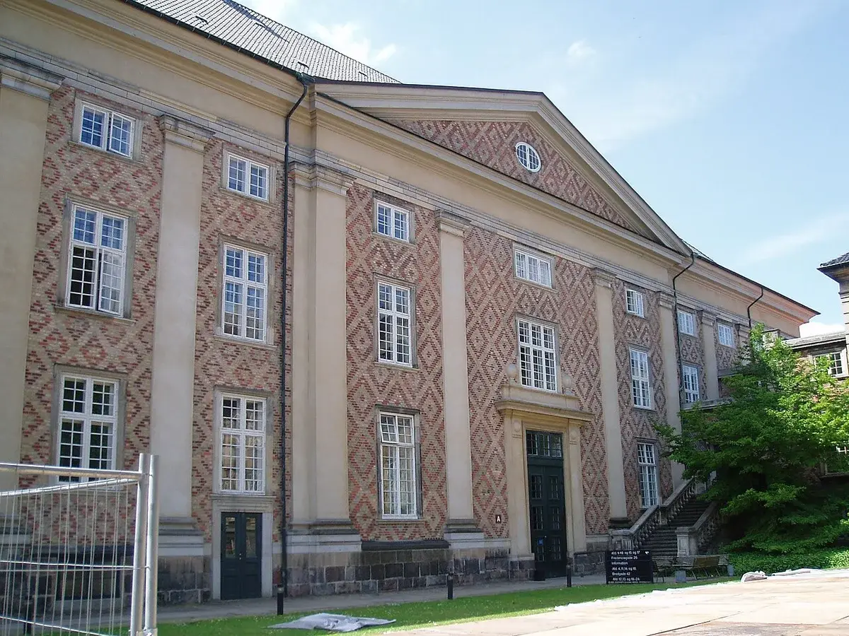 The northern facade of the Danish Eastern High Court building in Copenhagen, with patterned brick walls and tall windows.