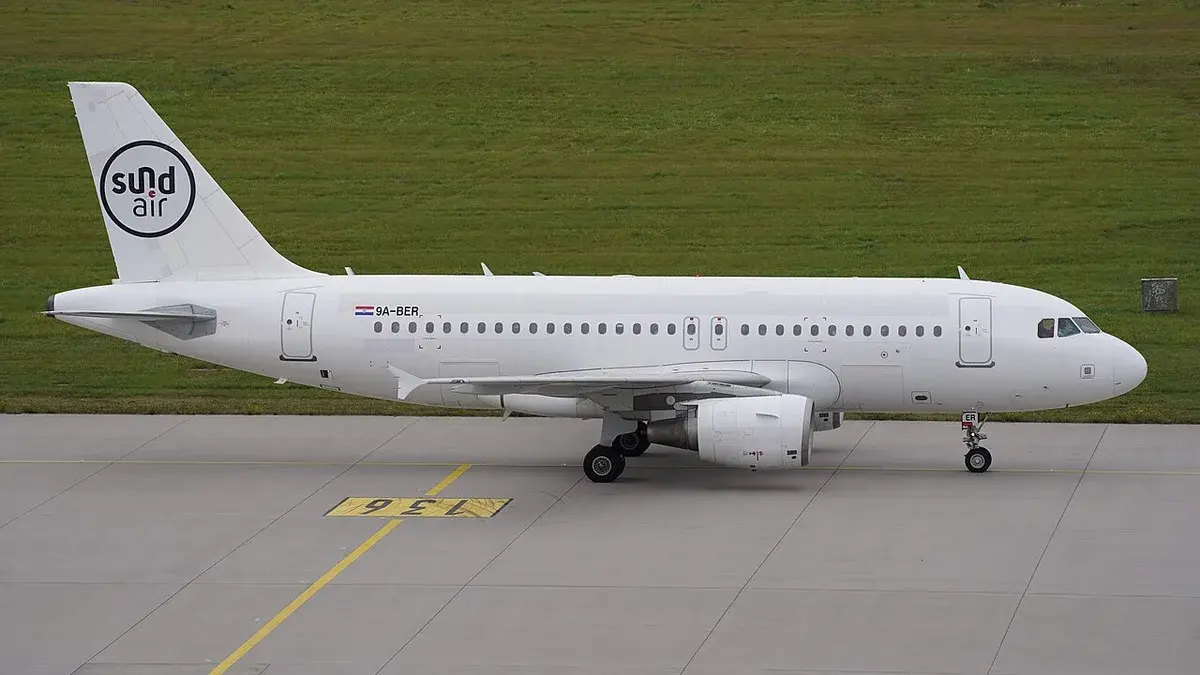 Airbus A319 aircraft of Sund Air taxiing on runway