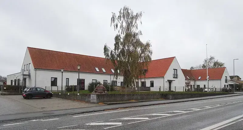 White building with red tiled roof, former Svinninge Town Hall
