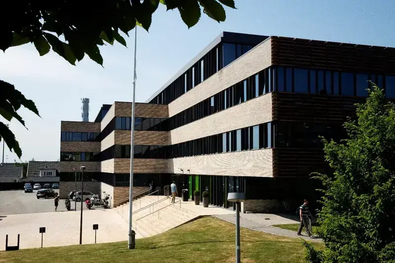 modern Roskilde Police Station building with horizontal brick and glass stripes