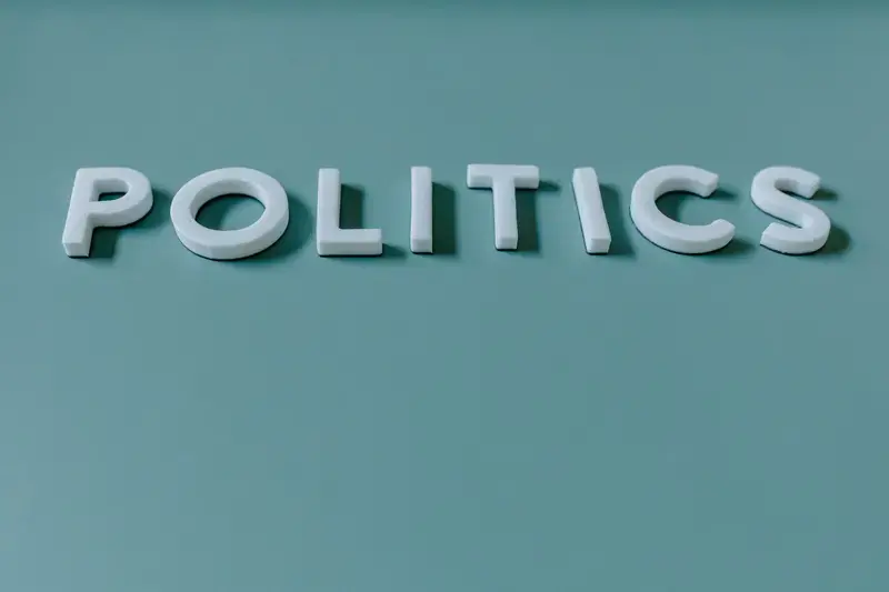 Word 'POLITICS' in white letters on teal background