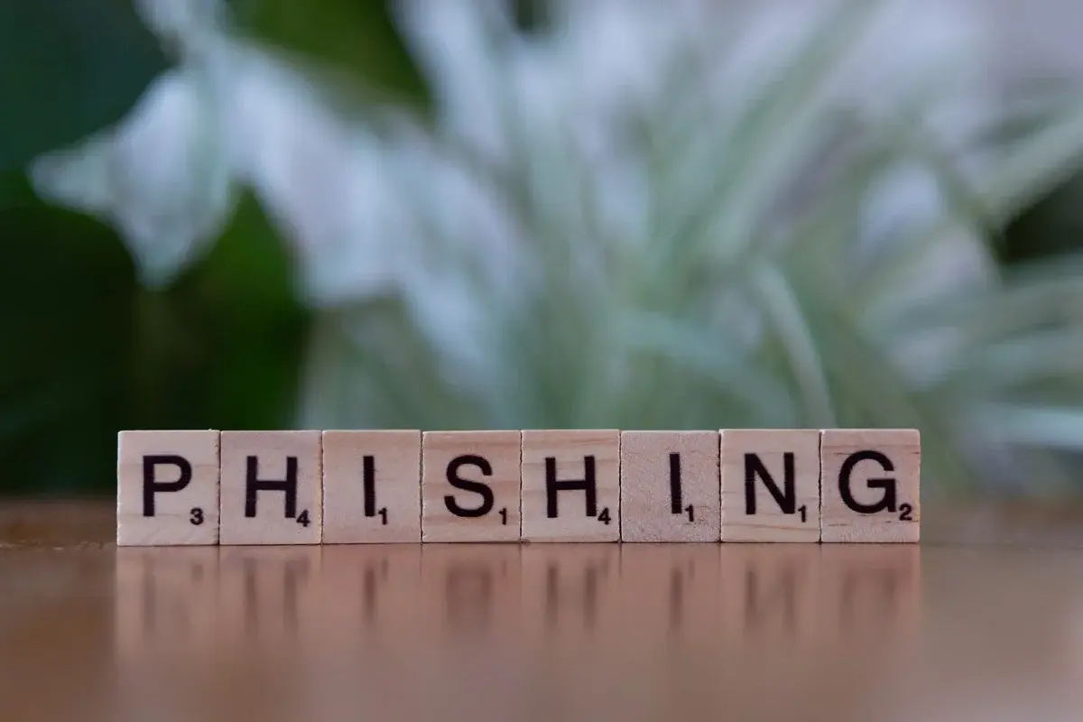 Wooden tiles spelling phishing
