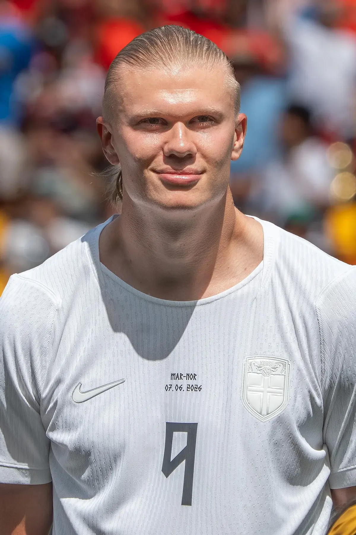 Erling Haaland in a Norway football jersey during a match.