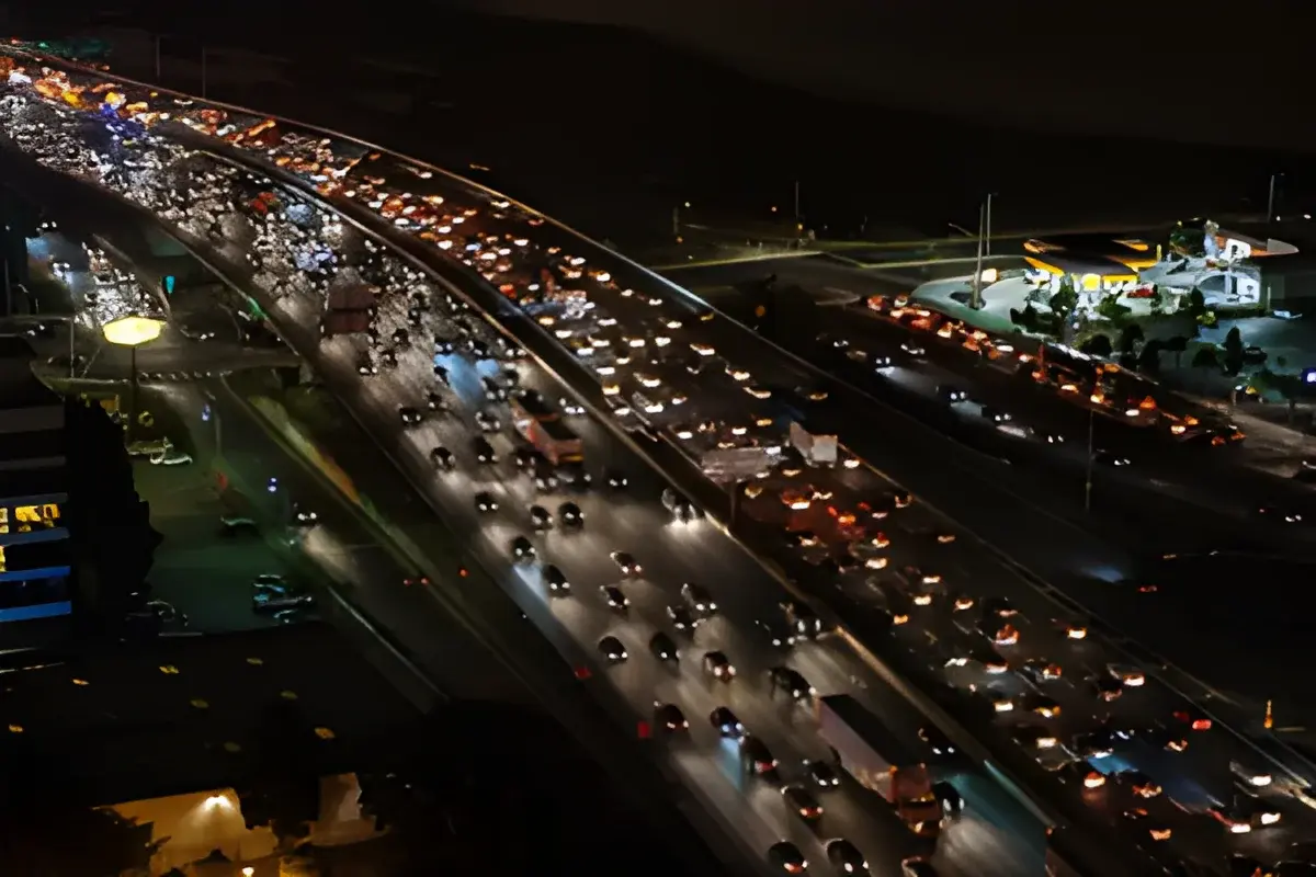 Nighttime slow-moving traffic jam on a busy freeway